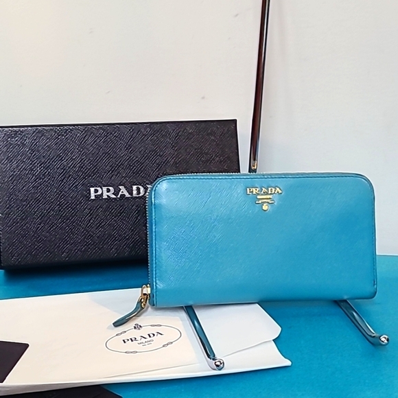 Prada Handbags - Prada Turquoise Zip Around Saffiano Leather Wallet